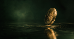 Coin mid-spin — dopamine peaks at maximum reward uncertainty