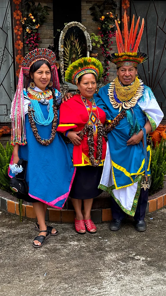 Three members of the Kamentsá family who run Shanayoy Healing Center, in ceremonial dress